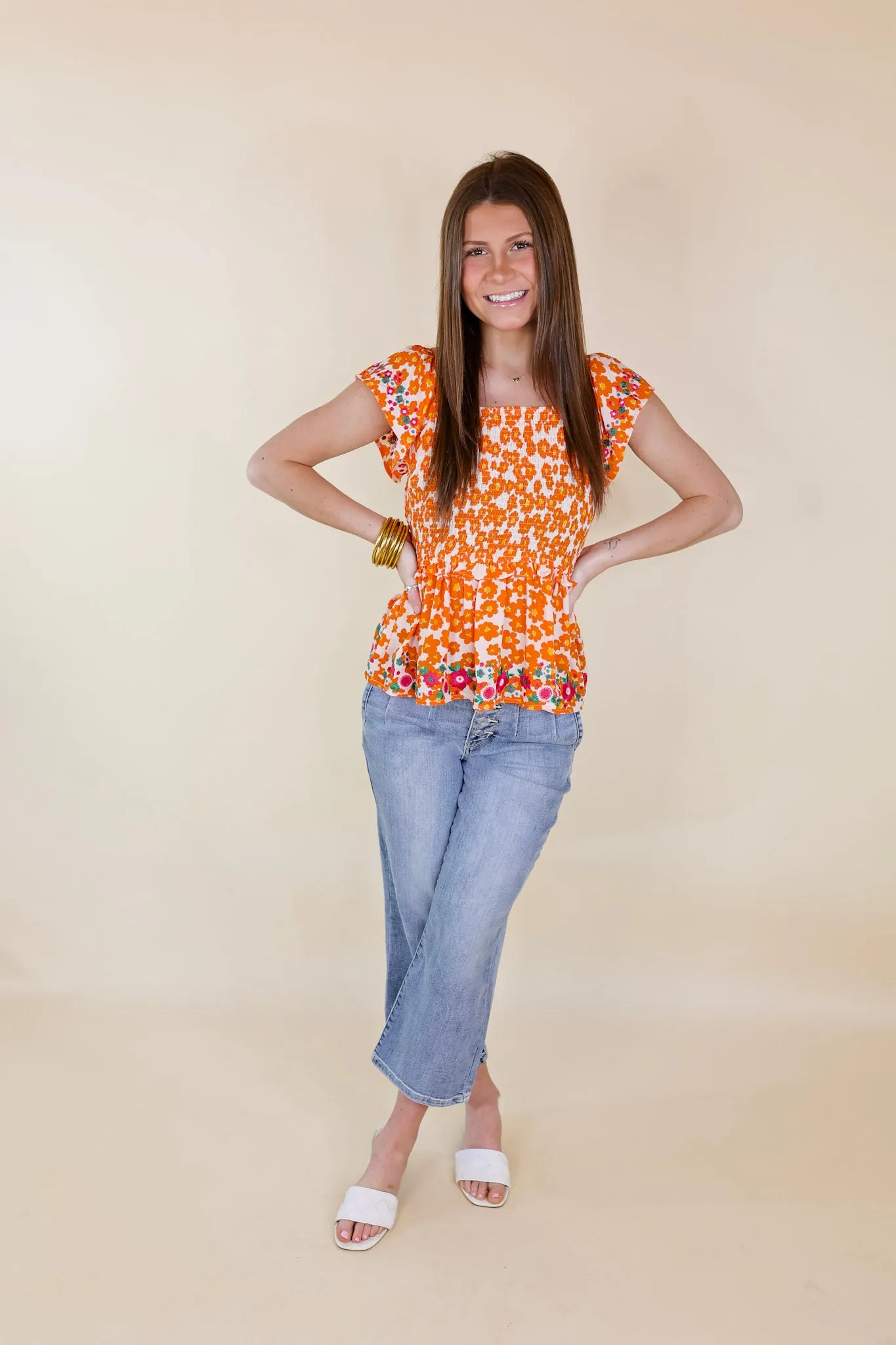 Blossom Boulevard Smocked Floral Peplum Top with Floral Embroidery in Orange