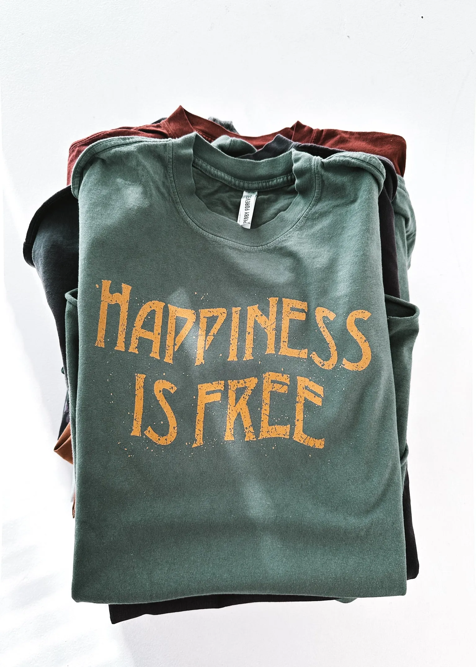 HAPPINESS IS FREE SIDE SLIT TEE